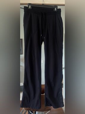 Athleta flare yoga pants front and back pockets drawstring sz Small Black Cotton